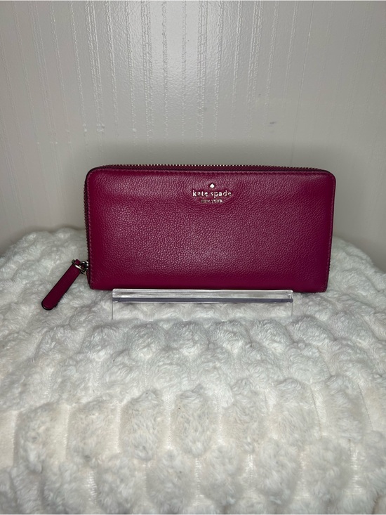 kate spade Handbags - kate spade pebbled leather zip wallet in magenta